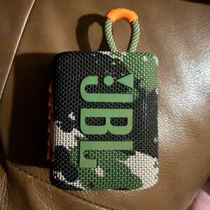 JBL Camouflage Bluetooth Speaker with Orange Accent